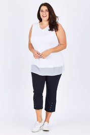 Model Mae wearing size XXL of the Reversible Scoop/v Neck Tank in colour White (White), from the front, showing the whole outfit