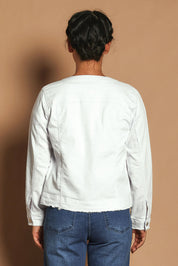 Model Katie wearing size S of the Collarless Jacket in colour White (White), from the back