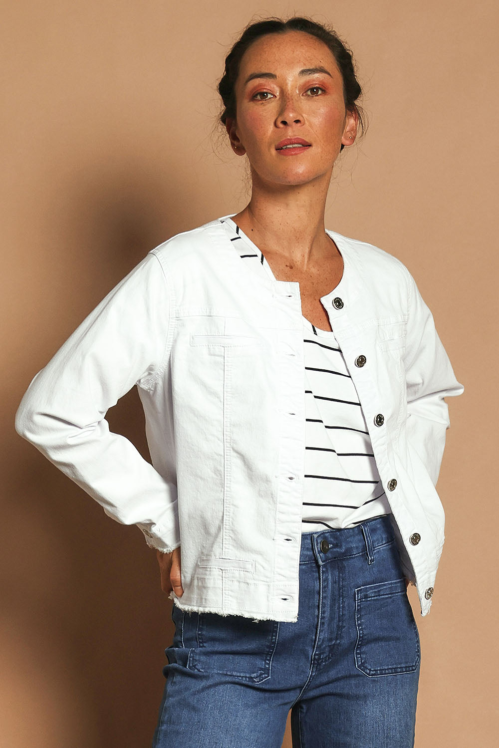 Model Katie wearing size S of the Collarless Jacket in colour White (White), from the front, showing the whole outfit