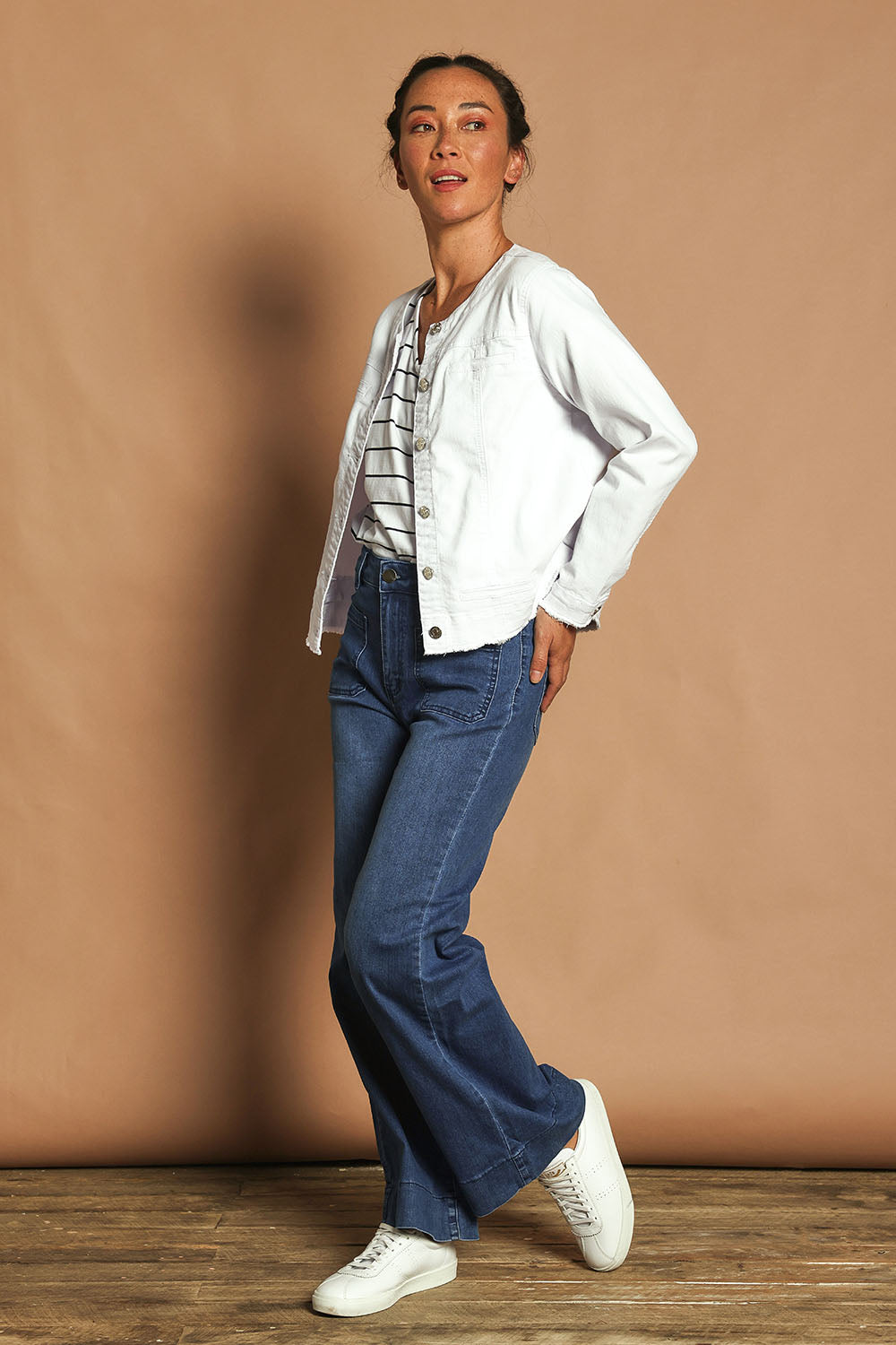 Model Katie wearing size S of the Collarless Jacket in colour White (White), from the front, showing the whole outfit