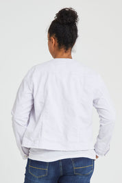 Model Noli wearing size L of the Collarless Jacket in colour White (White), from the back