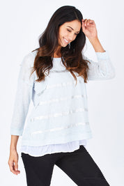 Model Gemma wearing size S of the Foil Striped 2 In 1 Top in colour Blue (Blue), from the front, cropped image