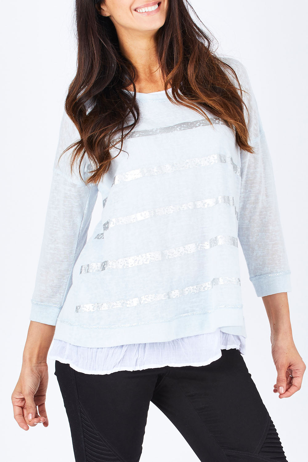 Model Gemma wearing size S of the Foil Striped 2 In 1 Top in colour Blue (Blue), from the front, cropped image