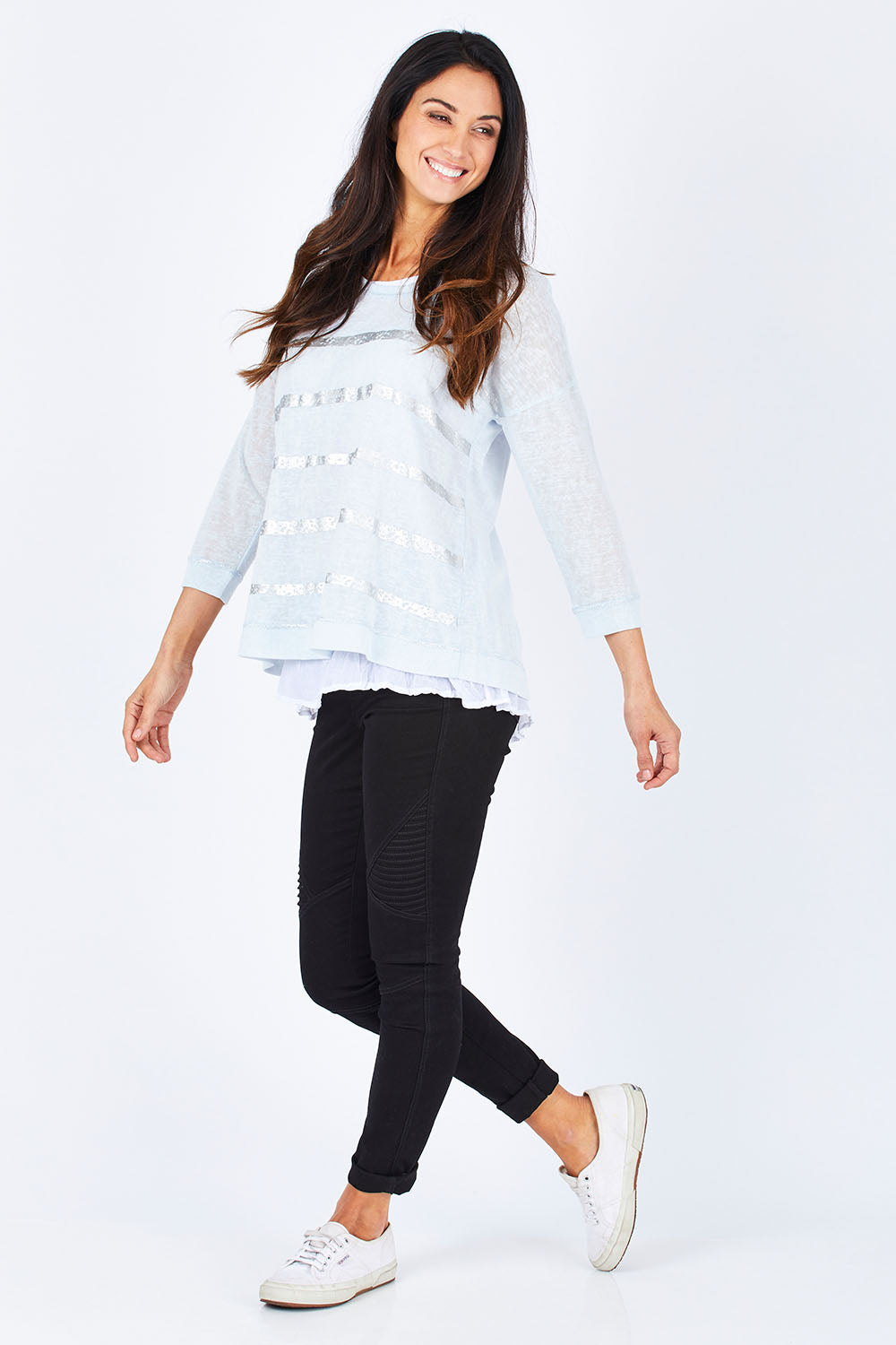 Model Gemma wearing size S of the Foil Striped 2 In 1 Top in colour Blue (Blue), from the front, showing the whole outfit