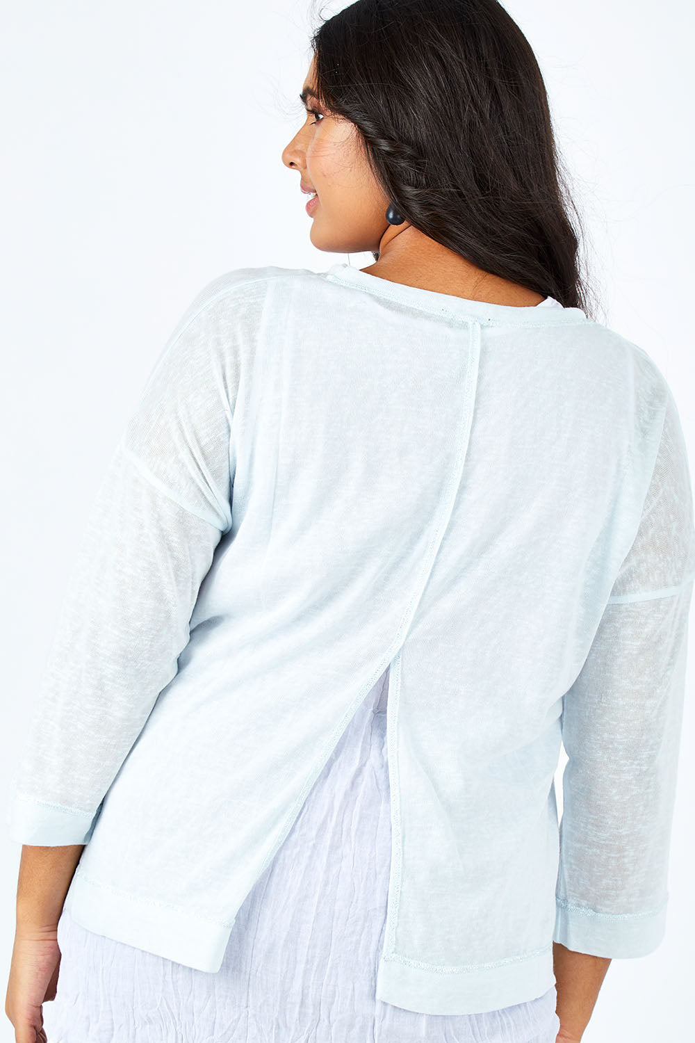 Model Shanaya wearing size L of the Foil Striped 2 In 1 Top in colour Blue (Blue), from the back