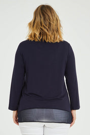 Model Jess wearing size L of the L/S Georgette Hem Top in colour Navy (Blue), from the back