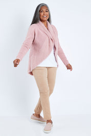Model Nadine wearing size S of the Faux Fur Cardigan in colour Rose (Pink), from the front, showing the whole outfit