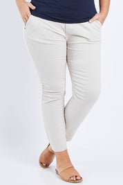 Model Fiona wearing size XL of the Jogger Jean in colour Natural, from the front, cropped image