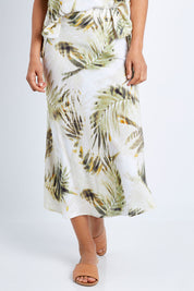 Model Pamela wearing size S of the Palm Print Skirt in colour Print (Green), from the front, cropped image