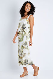 Model Pamela wearing size S of the Palm Print Skirt in colour Print (Green), from the front, showing the whole outfit