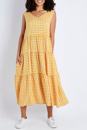 Model Pamela wearing size S of the Check Panelled Dress in colour Yellow, from the front, cropped image