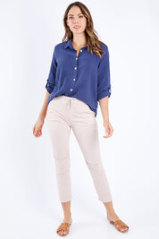 Model Madeline wearing size S of the Lightweight Jogger Jean in colour Palepink (Pink), from the front, showing the whole outfit