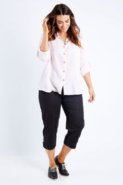 Model Laura wearing size L of the Santorini Cotton Pant in colour Black (Black), from the front, showing the whole outfit