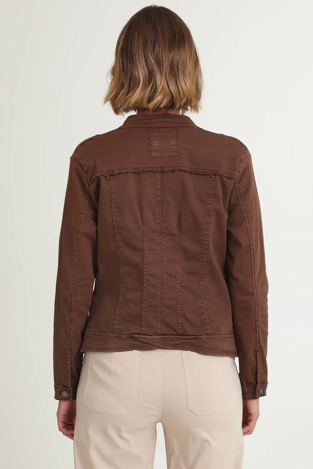 Model Riina wearing size S of the Military Denim Jacket in colour Chocolate, from the back