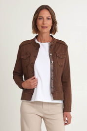 Model Riina wearing size S of the Military Denim Jacket in colour Chocolate, from the front, cropped image