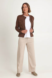 Model Riina wearing size S of the Military Denim Jacket in colour Chocolate, from the front, showing the whole outfit