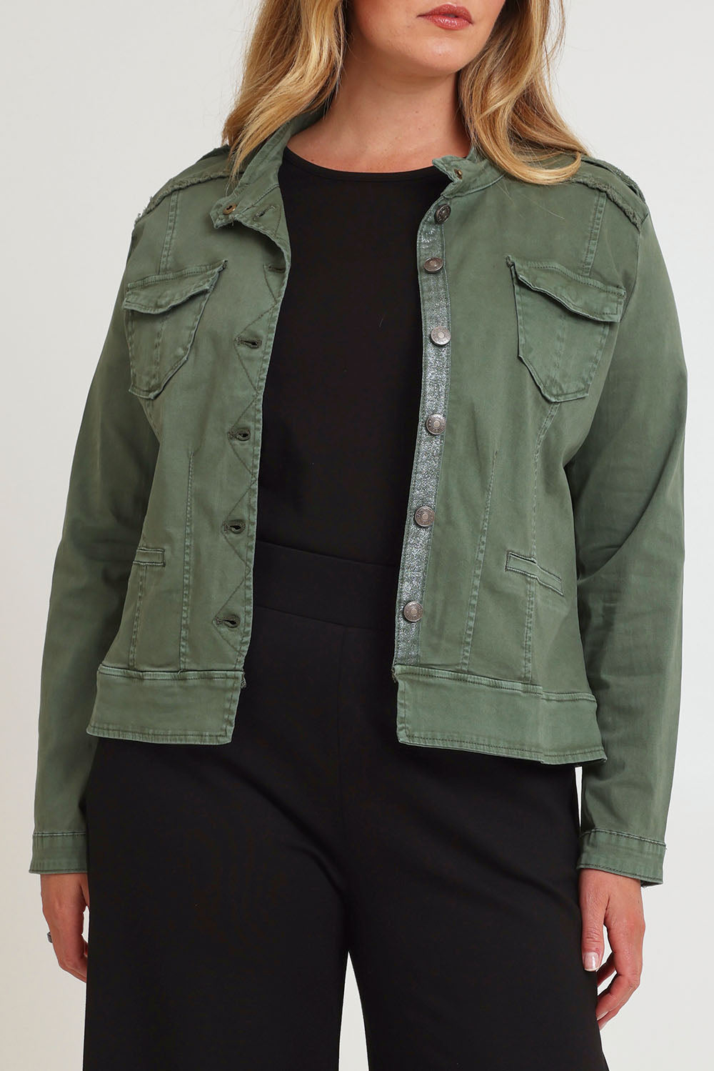 Model Chanel wearing size XL of the Military Denim Jacket in colour Khaki (Green), from the front, cropped image