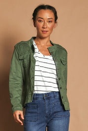Model Katie wearing size S of the Military Denim Jacket in colour Khaki (Green), from the front, showing the whole outfit