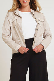 Model Chanel wearing size XL of the Military Denim Jacket in colour Natural, from the front, cropped image