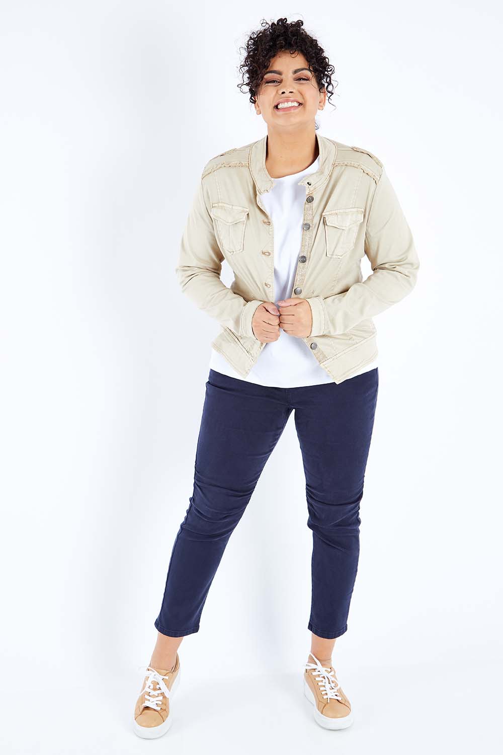 Model Sasha-Lee wearing size XL of the Military Denim Jacket in colour Natural, from the front, showing the whole outfit