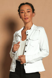 Model Katie wearing size S of the Military Denim Jacket in colour White (White), from the front, showing the whole outfit
