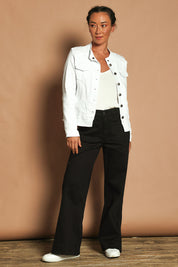 Model Katie wearing size S of the Military Denim Jacket in colour White (White), from the front, showing the whole outfit