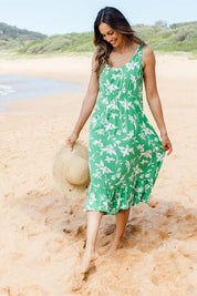 Model Amanda wearing size S of the Floral Print Sun Dress in colour Green (Green), from the front, showing the whole outfit