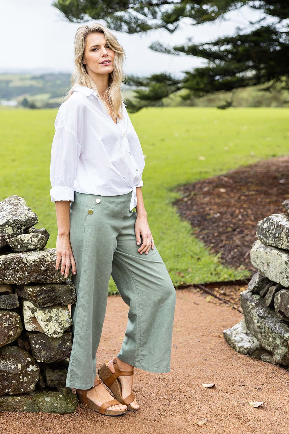 Model Kelly wearing size S of the Linen Blend Wide Leg Pant in colour Thyme (Green), from the front, showing the whole outfit