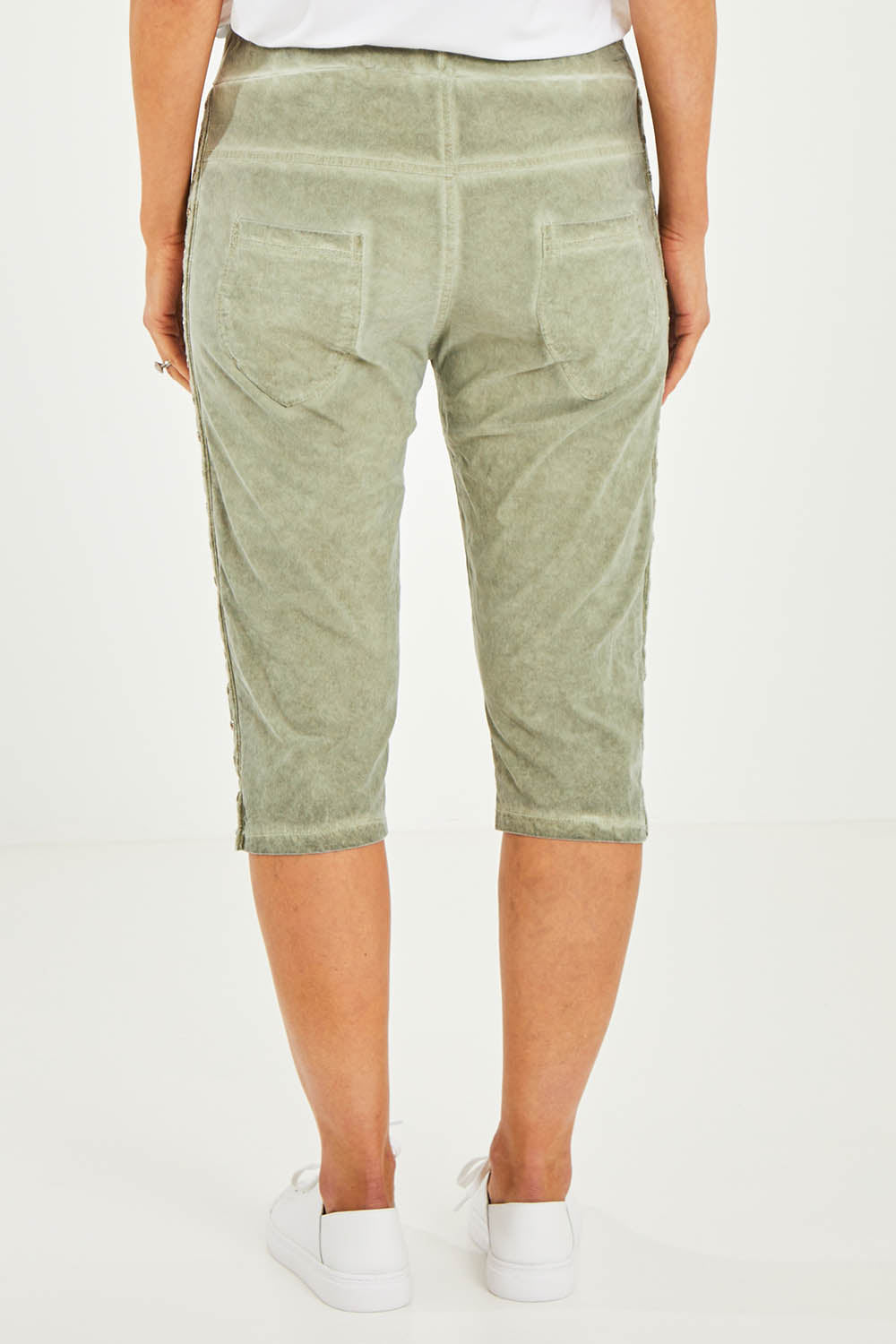 Model Kelly wearing size S of the Crushed Jean Short in colour Khaki (Green), from the back