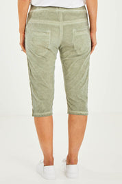 Model Kelly wearing size S of the Crushed Jean Short in colour Khaki (Green), from the back