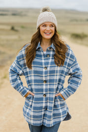 Model Sally wearing size S of the Perisher Check Shacket in colour Cornflower (Blue), from the front, showing the whole outfit