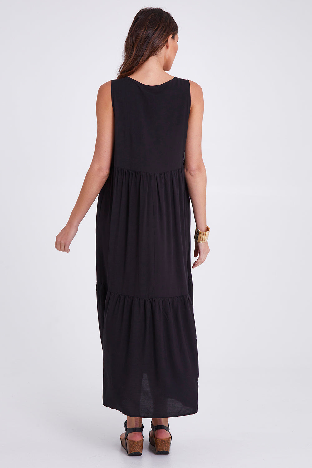 Model Madeline wearing size S of the Hamilton Dress in colour Black (Black), from the back