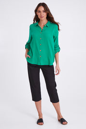 Model Madeline wearing size S of the Santorini Cotton Pant in colour Black (Black), from the front, showing the whole outfit