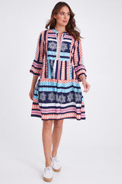 Model Madeline wearing size S of The Bondi Cotton Dress in colour Navymulti (Blue), from the front, showing the whole outfit