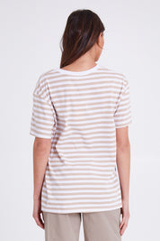 Model Madeline wearing size S of the Sailor Tee in colour Stonewhite (White), from the back