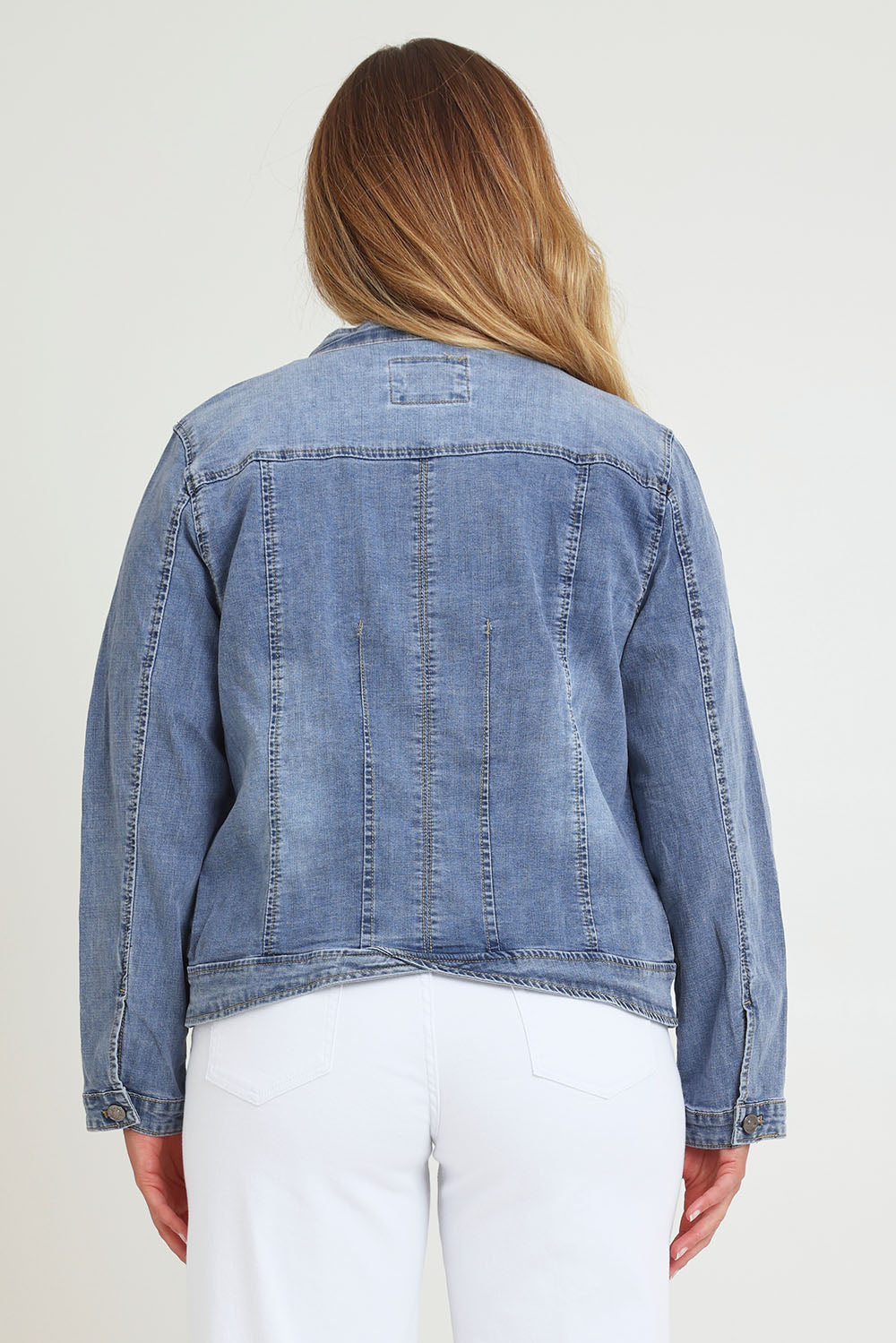 Model Chanel wearing size XL of the Maggie Denim Jacket in colour Denim (Blue), from the back