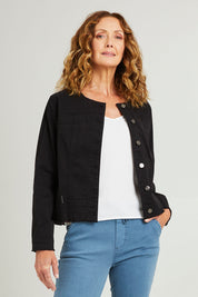 Model Emma wearing size S of the Collarless Denim Jacket in colour Black (Black), from the front, cropped image