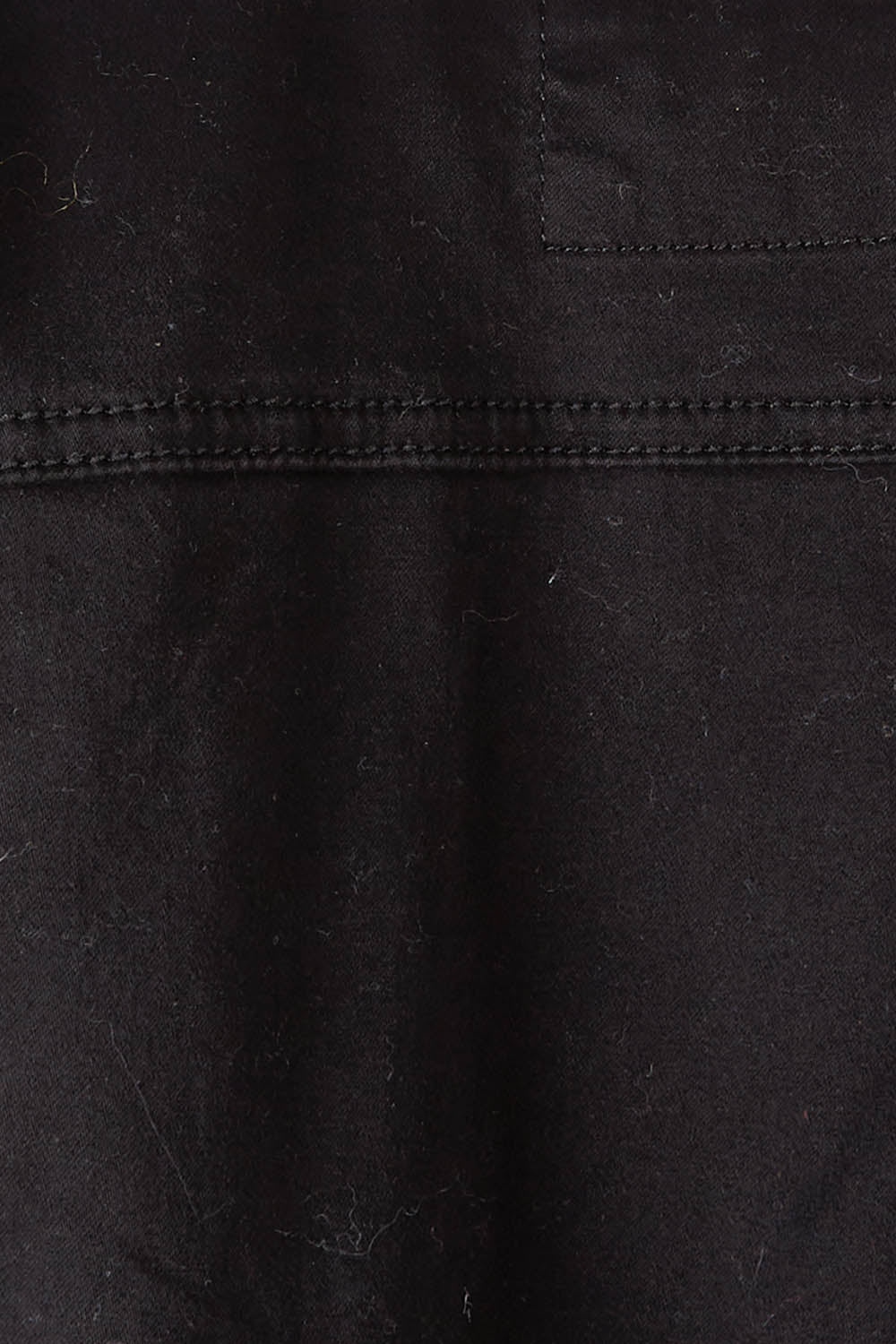 Product shot of the Collarless Denim Jacket in colour Black (Black), detail