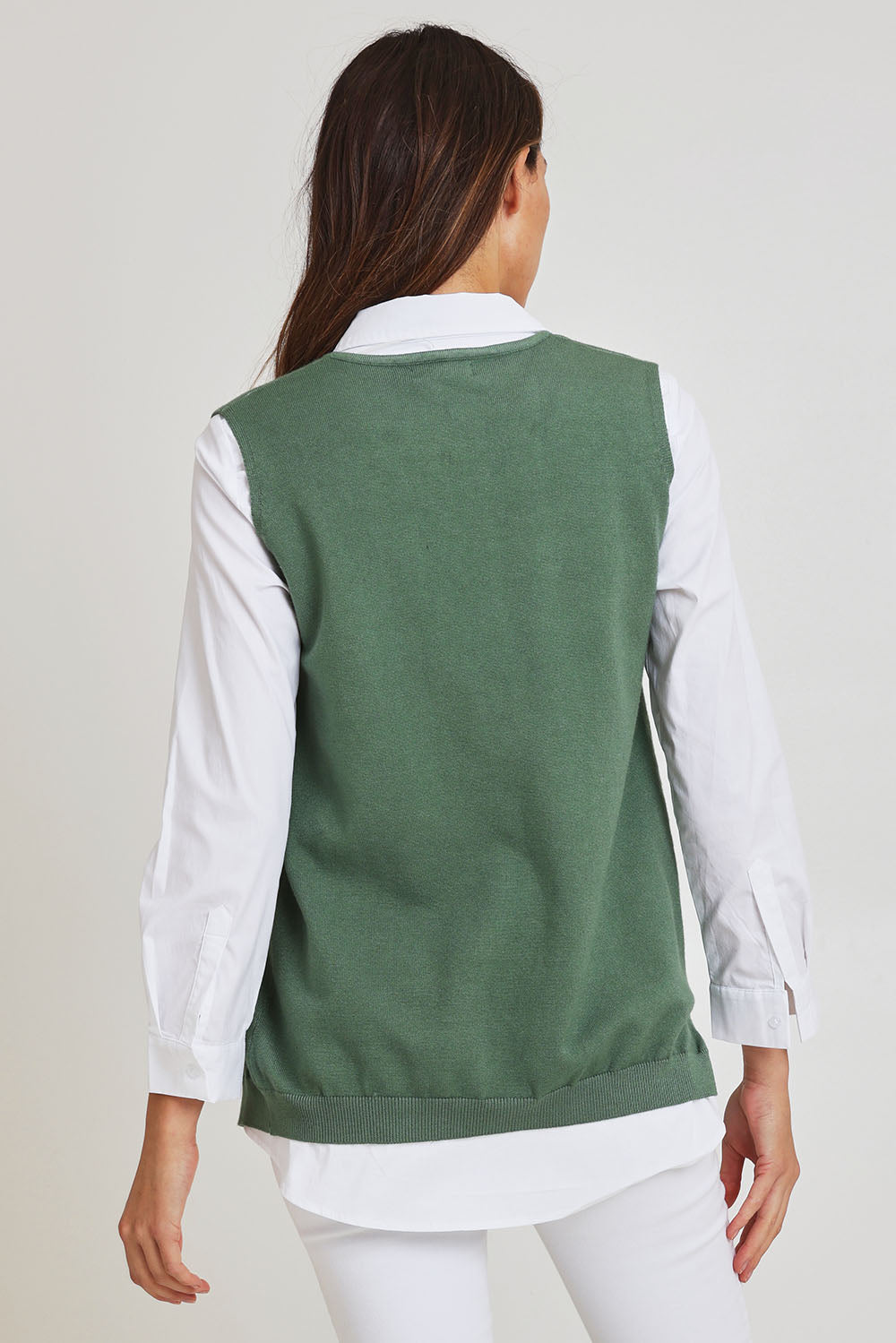 Model Madeline wearing size S of the Vicky Side Split Knit Vest in colour Khaki (Green), from the back