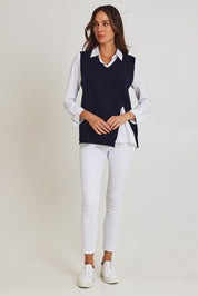 Model Madeline wearing size S of the Vicky Side Split Knit Vest in colour Navy (Blue), from the front, showing the whole outfit