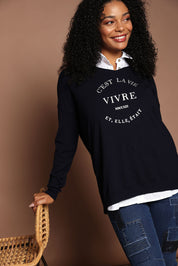 Model Ziara wearing size S of the Cest La Vie Knit in colour Navy (Blue), from the front, showing the whole outfit