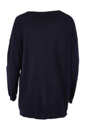 Product shot of the Cest La Vie Knit in colour Navy (Blue), from the back