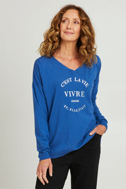 Model Emma wearing size S of the Cest La Vie Knit in colour Sapphire (Blue), from the front, cropped image