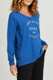 Model Emma wearing size S of the Cest La Vie Knit in colour Sapphire (Blue), from the front, cropped image