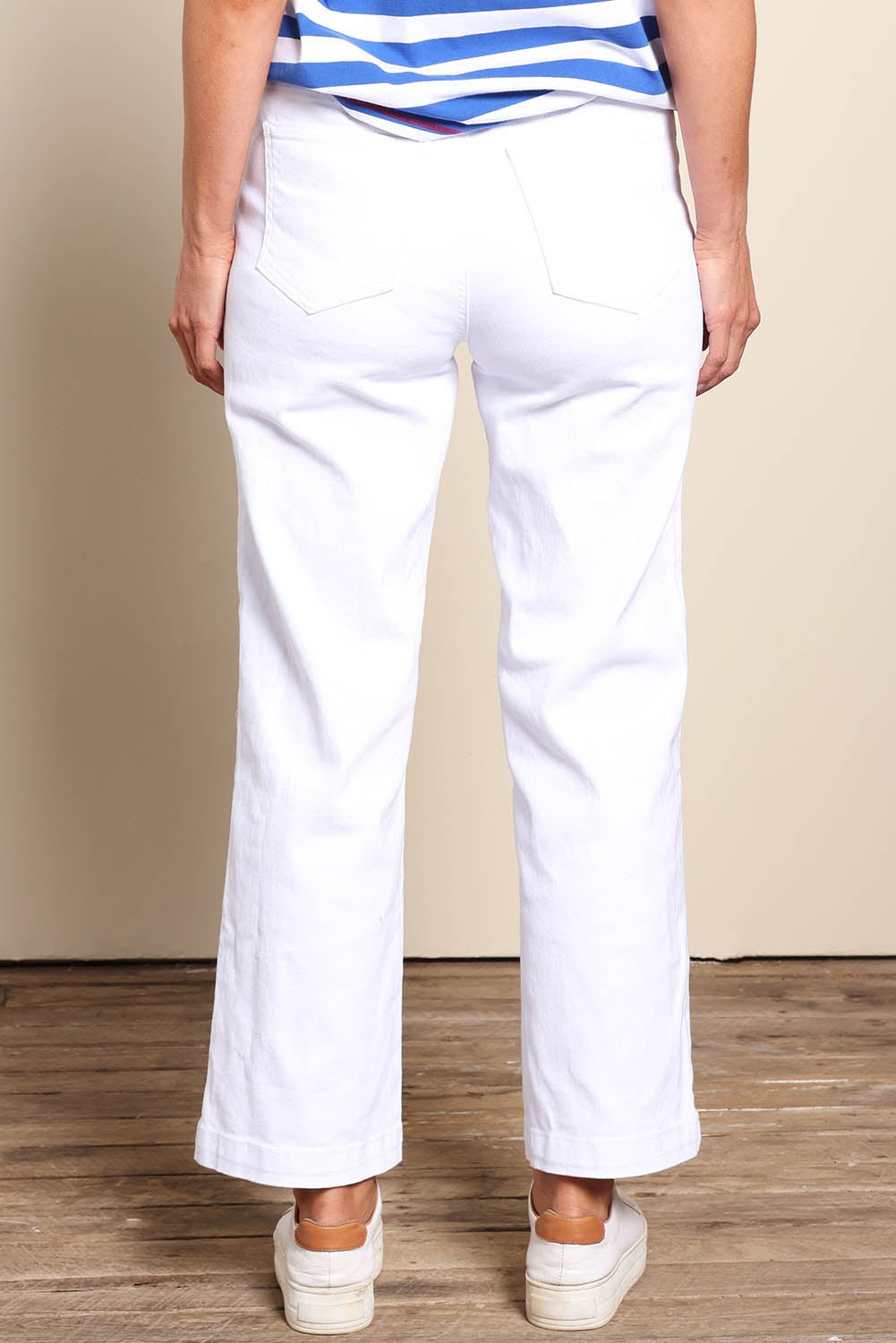 Model Riinar wearing size 10 of the Maddy Wide Leg Jean - White in colour White, from the front