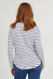 Model Katie wearing size S of the Annie Star Stripe Tee in colour Navywhite (White), from the back