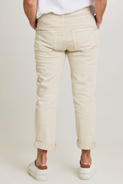Model Sandy wearing size S of the Isabella Cotton Pant in colour Natural, from the back