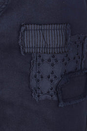 Product shot of the Portia Denim Skirt in colour Navy (Blue), detail