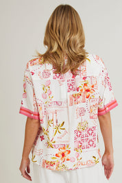 Model Grace wearing size S of the Ciao Bella Shirt in colour Pink (Pink), from the back