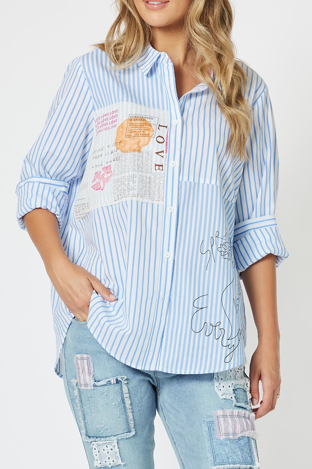 A model wearing the Love Me Stripe Cotton Shirt in colour Blue (Blue), from the front, cropped image